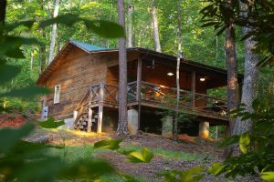 Exterior view of Outrigger Log Cabin at Cottages at Spirng House Farm near Marion, NC
