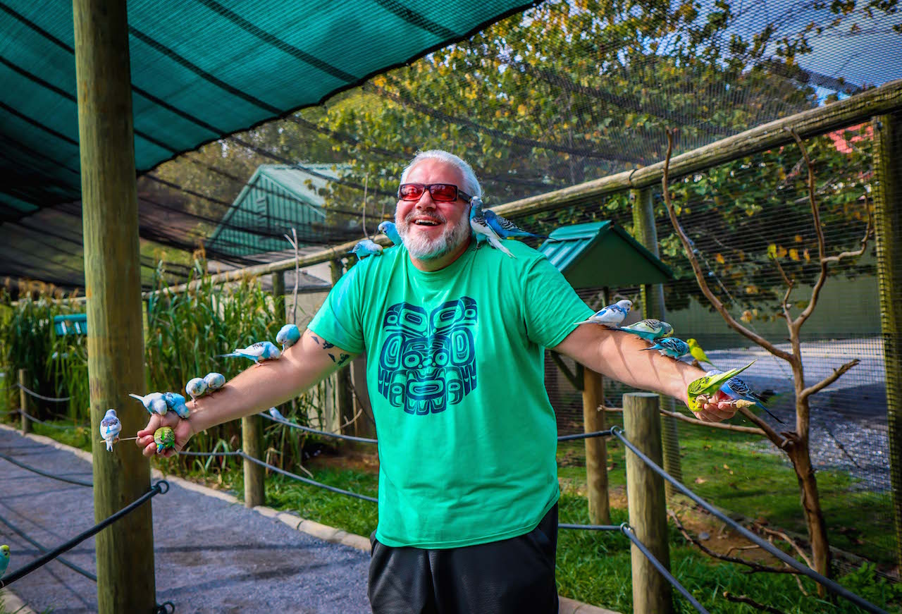 Author Bret Love with Budgies at Virginia Safari Park