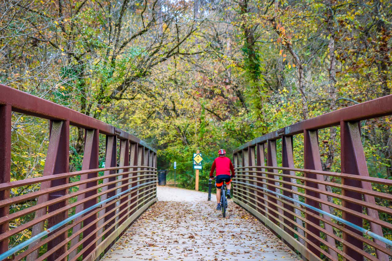 Cyclist on Bridge at Olde Rope Mill Park