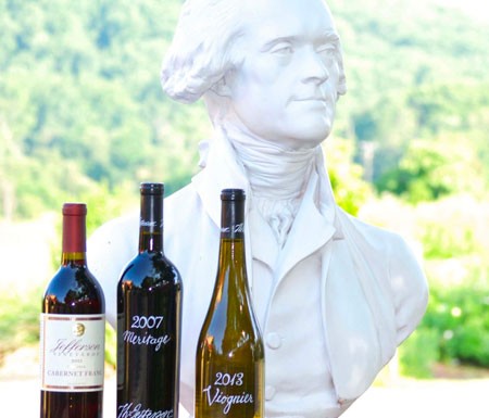 Wineries in Charlottesville VA - Jefferson bust next to bottles of wine