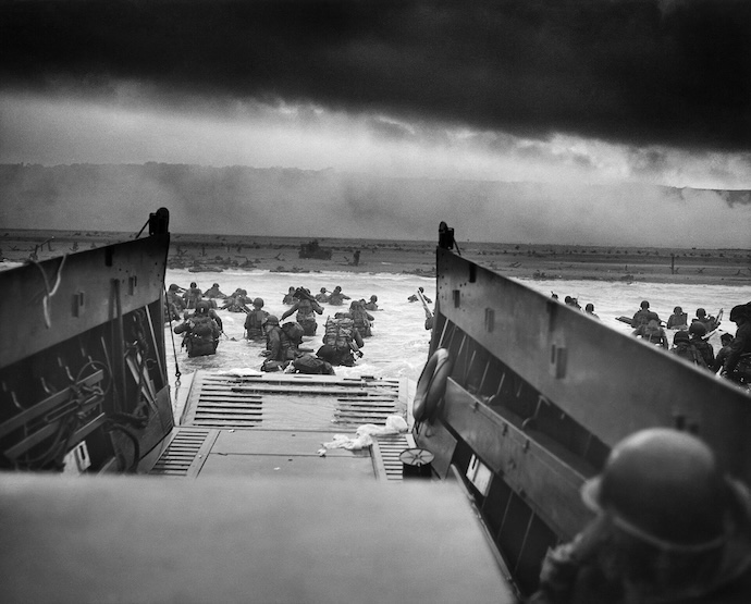 Landing Craft at Omaha Beach on D-Day, photo by Robert F. Sargent via Public Domain 